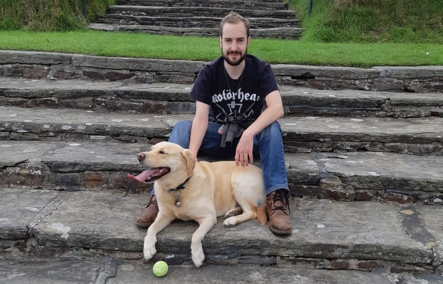 Student counsellor Robert and his guide dog Angel offer